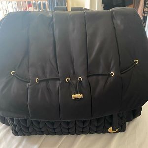 Chic Black Baby Bag with Gold Accents